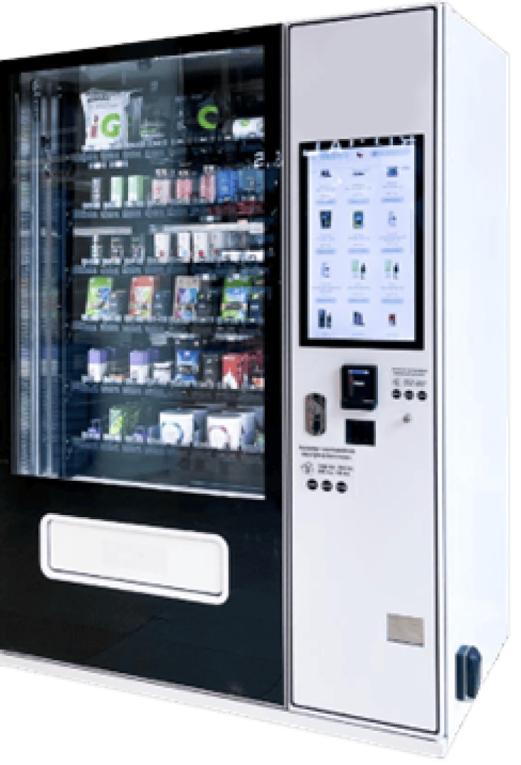 Ein moderner Verkaufsautomat mit Glasfront, der verschiedene Snacks und Getränke ausstellt, mit digitalem Touchscreen für die Auswahl und Zahlungsmöglichkeiten wie Karte und Bargeld.