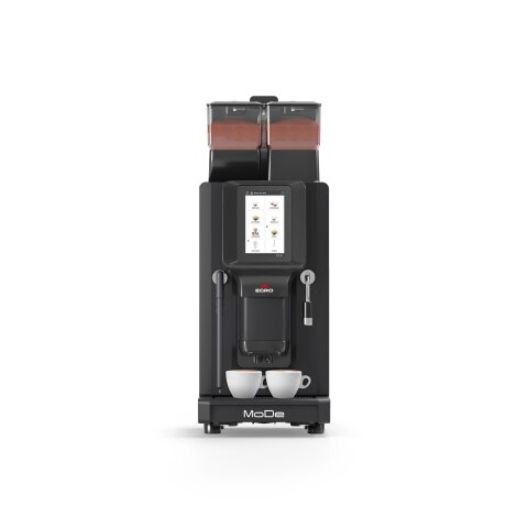 Une machine à café moderne de couleur noire avec un écran tactile numérique, deux trémies à grains sur le dessus et deux tasses blanches placées sous le distributeur, le tout sur fond blanc.