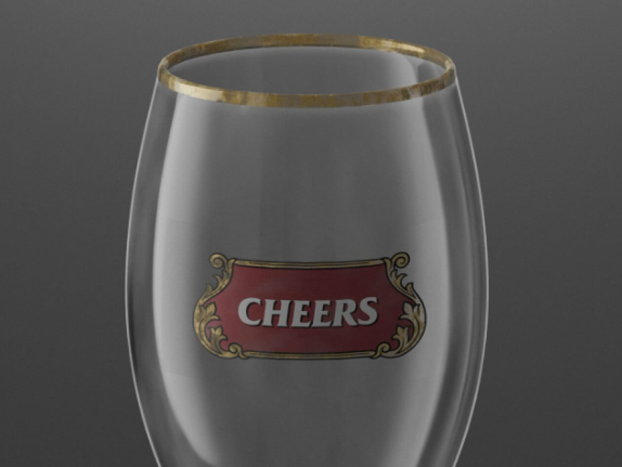 Ein klares Glas mit Goldrand trägt ein rotes Etikett mit goldenen Zierrändern und dem Wort "CHEERS" in fetten weißen Buchstaben auf der Vorderseite. Der Hintergrund ist einfarbig und grau.